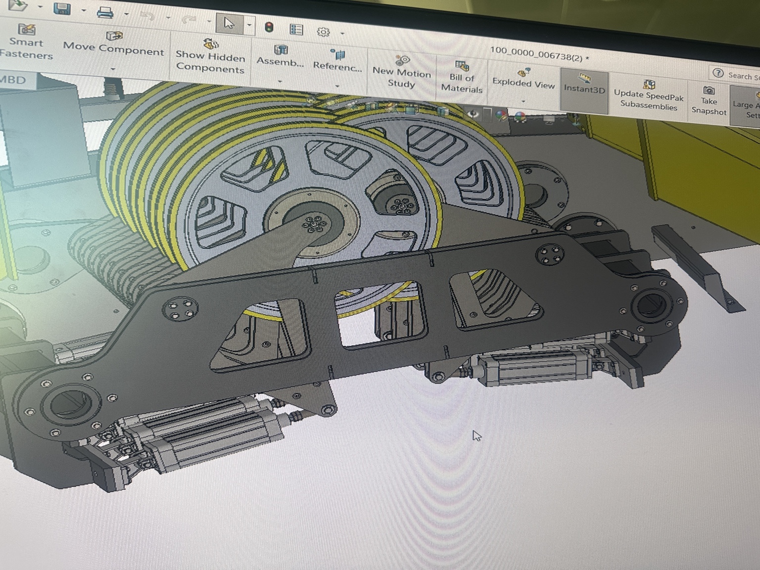 CAD model of wire wheels and pneumatic tensioning assemblies